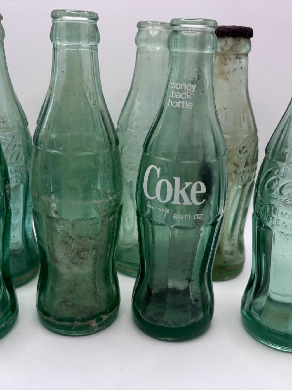 8 Vintage Hobbleskirt Coca Cola bottles